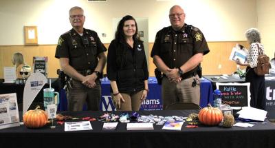 Major Chuck Milton, UWDC CEO Zella Taylor, and Chief Deputy Steve Sturgis